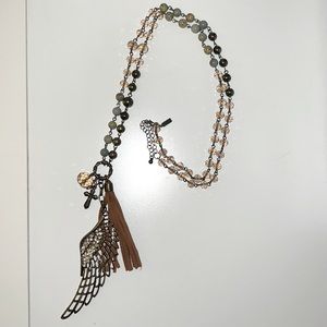 Long beaded wing charm necklace